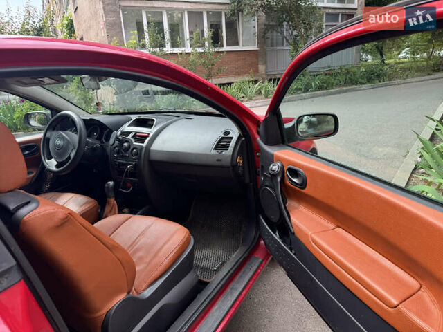 Красный Рено Меган, объемом двигателя 1.6 л и пробегом 285 тыс. км за 4500 $, фото 5 на Automoto.ua