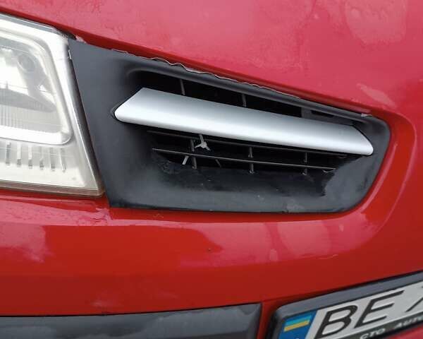 Красный Рено Меган, объемом двигателя 1.6 л и пробегом 230 тыс. км за 4200 $, фото 7 на Automoto.ua