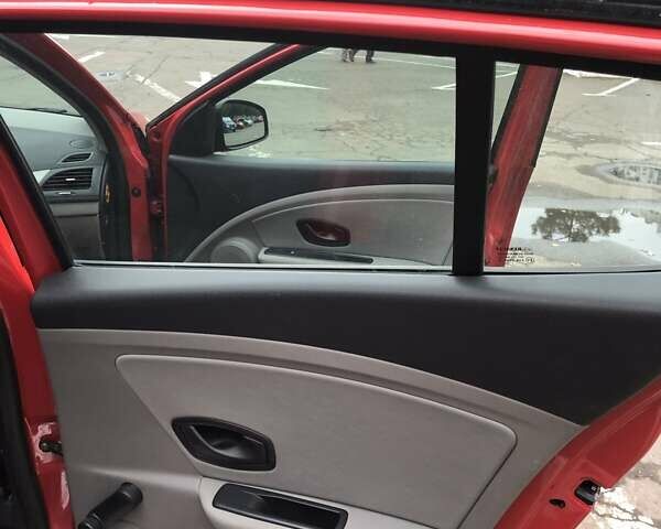 Червоний Рено Меган, об'ємом двигуна 1.6 л та пробігом 176 тис. км за 6799 $, фото 36 на Automoto.ua