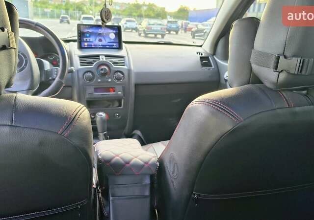 Красный Рено Меган, объемом двигателя 1.4 л и пробегом 251 тыс. км за 5000 $, фото 11 на Automoto.ua