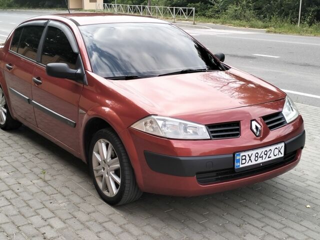 Рено Меган 2005 в Красилове на Automoto.ua Красный Рено Меган, объемом двигателя 1.4 л и пробегом 166 тыс. км за 3300 $, фото 1 на Automoto.ua