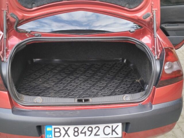 Рено Меган 2005 в Красилове на Automoto.ua Красный Рено Меган, объемом двигателя 1.4 л и пробегом 166 тыс. км за 3300 $, фото 9 на Automoto.ua