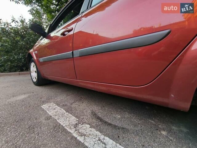 Червоний Рено Меган, об'ємом двигуна 1.4 л та пробігом 251 тис. км за 3700 $, фото 14 на Automoto.ua
