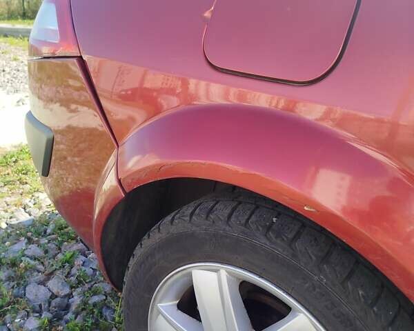 Красный Рено Меган, объемом двигателя 1.6 л и пробегом 242 тыс. км за 4700 $, фото 4 на Automoto.ua