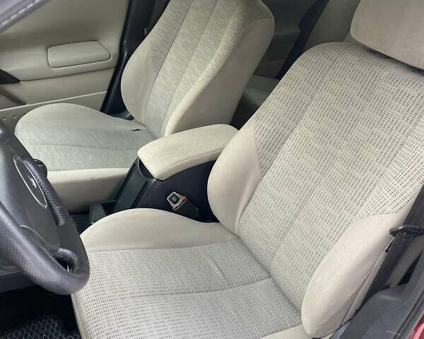 Красный Рено Меган, объемом двигателя 1.6 л и пробегом 115 тыс. км за 5500 $, фото 16 на Automoto.ua