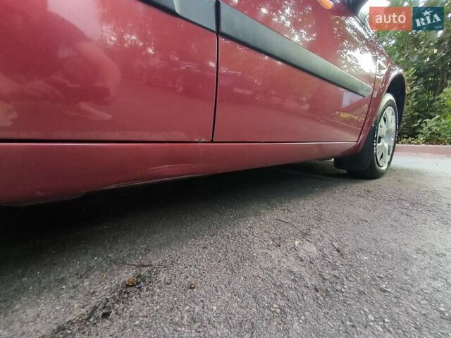Червоний Рено Меган, об'ємом двигуна 1.4 л та пробігом 251 тис. км за 3700 $, фото 13 на Automoto.ua