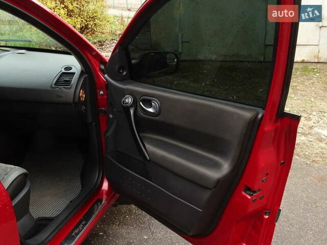 Червоний Рено Меган, об'ємом двигуна 1.39 л та пробігом 310 тис. км за 3750 $, фото 7 на Automoto.ua