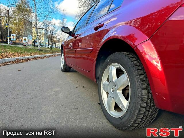 Красный Рено Меган, объемом двигателя 1.6 л и пробегом 180 тыс. км за 5500 $, фото 7 на Automoto.ua