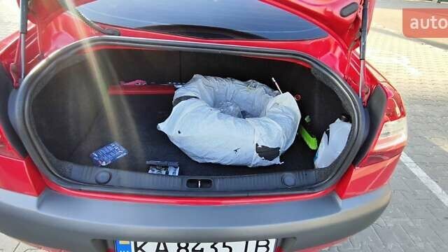 Червоний Рено Меган, об'ємом двигуна 1.6 л та пробігом 198 тис. км за 5000 $, фото 26 на Automoto.ua