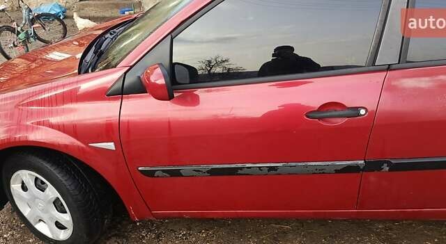 Червоний Рено Меган, об'ємом двигуна 1.39 л та пробігом 238 тис. км за 3500 $, фото 6 на Automoto.ua