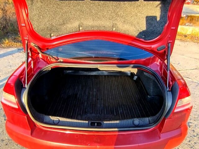 Красный Рено Меган, объемом двигателя 1.6 л и пробегом 189 тыс. км за 5800 $, фото 11 на Automoto.ua