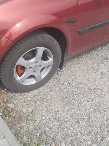 Рено Меган 2004 в Первомайск на Automoto.ua Красный Рено Меган, объемом двигателя 1.6 л и пробегом 257 тыс. км за 4750 $, фото 16 на Automoto.ua