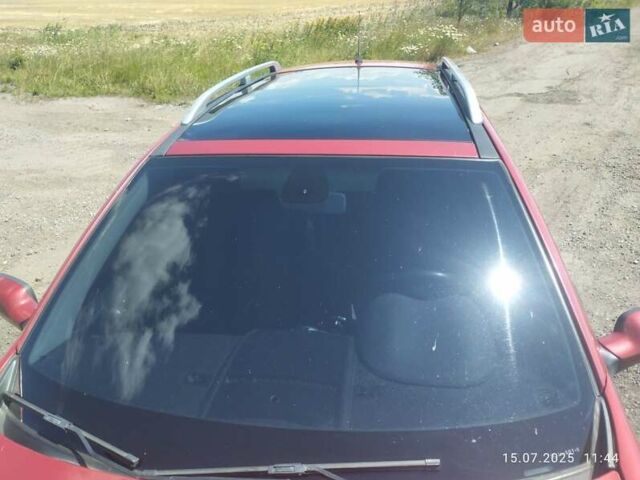 Красный Рено Меган, объемом двигателя 1.5 л и пробегом 250 тыс. км за 5500 $, фото 4 на Automoto.ua