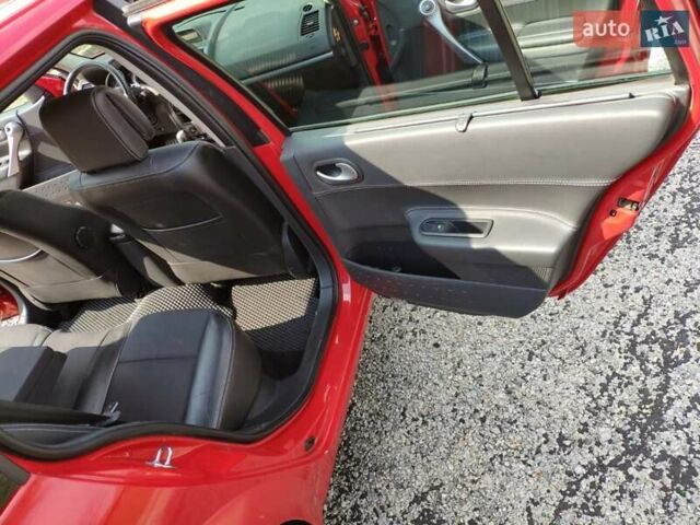 Красный Рено Меган, объемом двигателя 2 л и пробегом 326 тыс. км за 5300 $, фото 7 на Automoto.ua