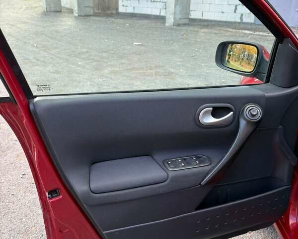 Рено Меган 2009 в Хмельницком на Automoto.ua Красный Рено Меган, объемом двигателя 1.6 л и пробегом 157 тыс. км за 5800 $, фото 28 на Automoto.ua