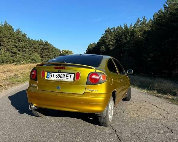 Жовтий Рено Меган, об'ємом двигуна 2 л та пробігом 235 тис. км за 2800 $, фото 7 на Automoto.ua