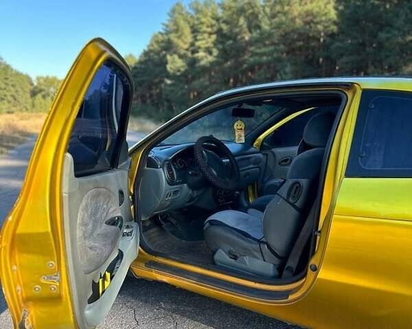 Жовтий Рено Меган, об'ємом двигуна 2 л та пробігом 235 тис. км за 2800 $, фото 13 на Automoto.ua
