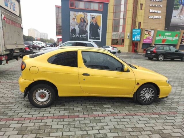 Жовтий Рено Меган, об'ємом двигуна 2 л та пробігом 210 тис. км за 2000 $, фото 3 на Automoto.ua