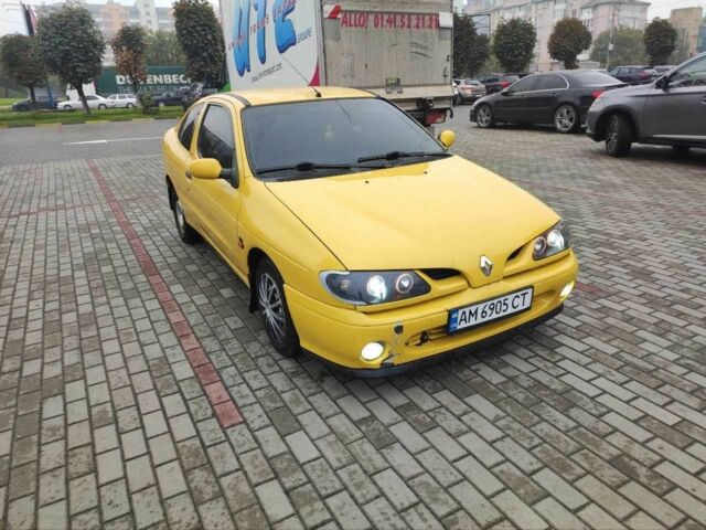 Жовтий Рено Меган, об'ємом двигуна 2 л та пробігом 210 тис. км за 2000 $, фото 2 на Automoto.ua