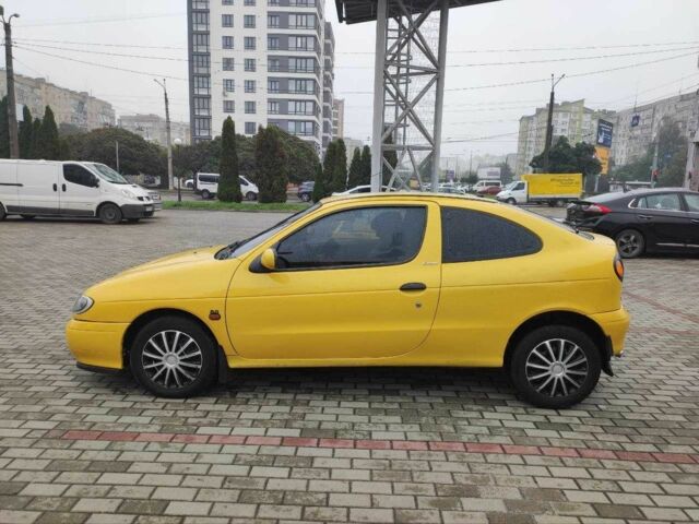 Жовтий Рено Меган, об'ємом двигуна 2 л та пробігом 210 тис. км за 2000 $, фото 4 на Automoto.ua