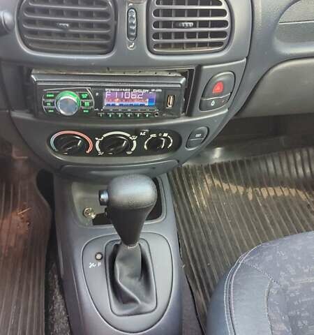 Серый Рено Меган, объемом двигателя 1.6 л и пробегом 326 тыс. км за 2600 $, фото 6 на Automoto.ua