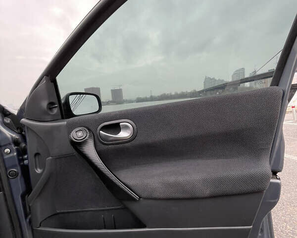 Сірий Рено Меган, об'ємом двигуна 1.39 л та пробігом 352 тис. км за 3999 $, фото 19 на Automoto.ua