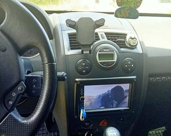 Серый Рено Меган, объемом двигателя 1.6 л и пробегом 277 тыс. км за 4600 $, фото 4 на Automoto.ua