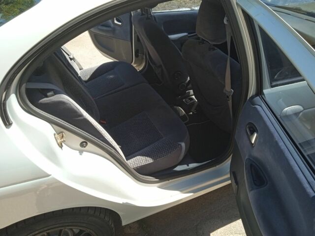 Серый Рено Меган, объемом двигателя 1.6 л и пробегом 322 тыс. км за 3500 $, фото 6 на Automoto.ua