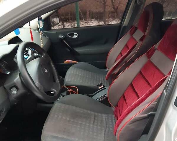 Сірий Рено Меган, об'ємом двигуна 1.4 л та пробігом 262 тис. км за 4000 $, фото 4 на Automoto.ua