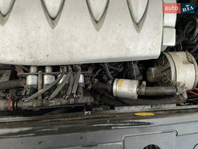 Сірий Рено Меган, об'ємом двигуна 1.6 л та пробігом 210 тис. км за 4555 $, фото 55 на Automoto.ua