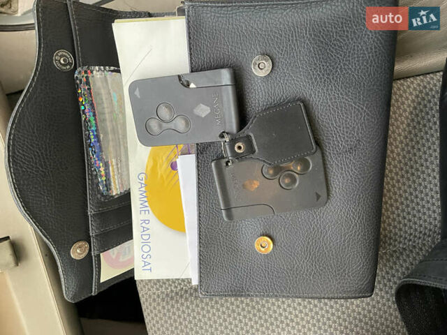 Сірий Рено Меган, об'ємом двигуна 1.6 л та пробігом 210 тис. км за 4555 $, фото 56 на Automoto.ua