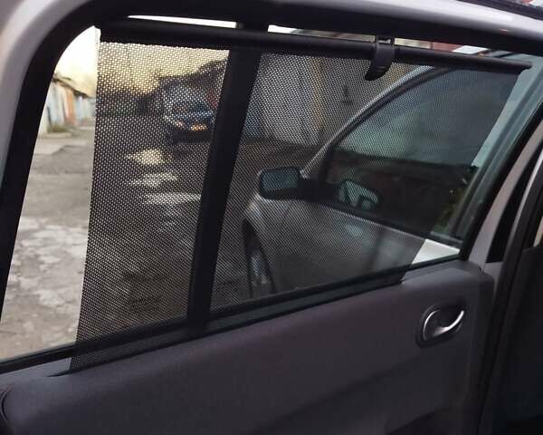 Серый Рено Меган, объемом двигателя 2 л и пробегом 162 тыс. км за 6299 $, фото 124 на Automoto.ua