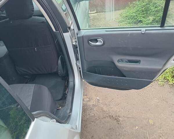 Серый Рено Меган, объемом двигателя 1.6 л и пробегом 308 тыс. км за 4500 $, фото 9 на Automoto.ua