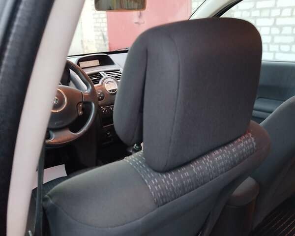 Серый Рено Меган, объемом двигателя 2 л и пробегом 162 тыс. км за 6299 $, фото 122 на Automoto.ua