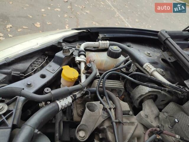 Серый Рено Меган, объемом двигателя 1.4 л и пробегом 250 тыс. км за 7500 $, фото 116 на Automoto.ua