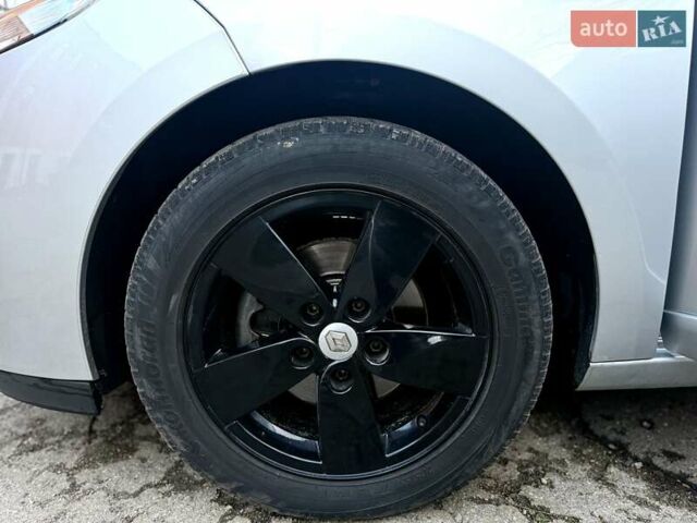 Сірий Рено Меган, об'ємом двигуна 1.6 л та пробігом 230 тис. км за 7700 $, фото 70 на Automoto.ua