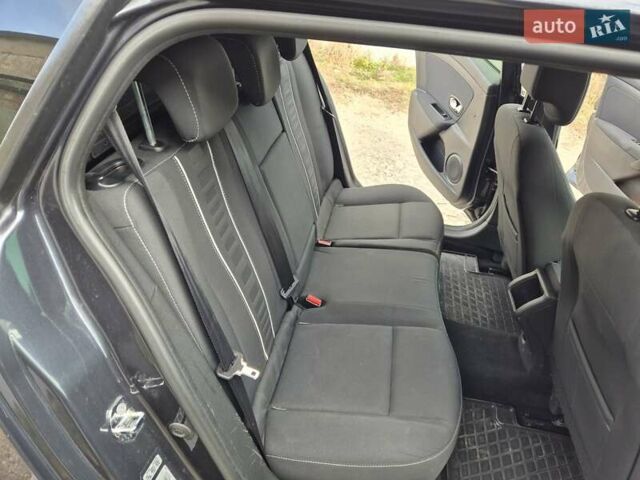 Серый Рено Меган, объемом двигателя 1.5 л и пробегом 302 тыс. км за 7150 $, фото 30 на Automoto.ua