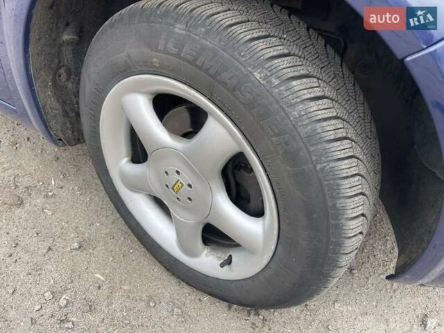 Синий Рено Меган, объемом двигателя 1.39 л и пробегом 185 тыс. км за 4500 $, фото 6 на Automoto.ua