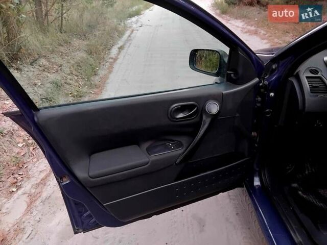 Синій Рено Меган, об'ємом двигуна 1.4 л та пробігом 190 тис. км за 3950 $, фото 10 на Automoto.ua