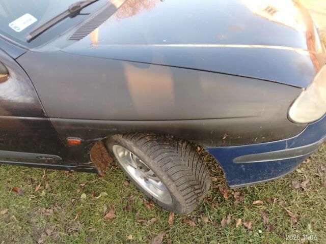 Синий Рено Меган, объемом двигателя 1.4 л и пробегом 420 тыс. км за 2500 $, фото 7 на Automoto.ua