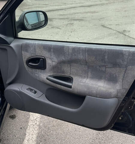 Синий Рено Меган, объемом двигателя 1.6 л и пробегом 310 тыс. км за 3100 $, фото 16 на Automoto.ua