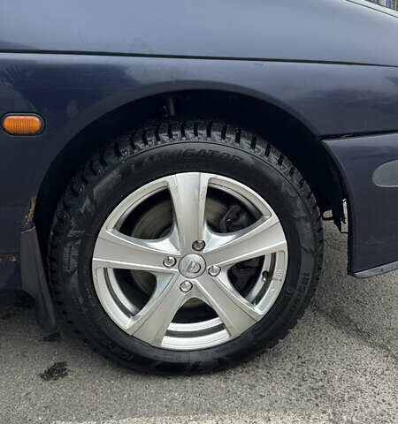 Синий Рено Меган, объемом двигателя 1.6 л и пробегом 310 тыс. км за 3100 $, фото 27 на Automoto.ua