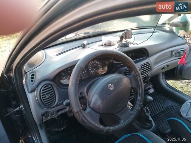 Синий Рено Меган, объемом двигателя 1.4 л и пробегом 420 тыс. км за 2408 $, фото 3 на Automoto.ua