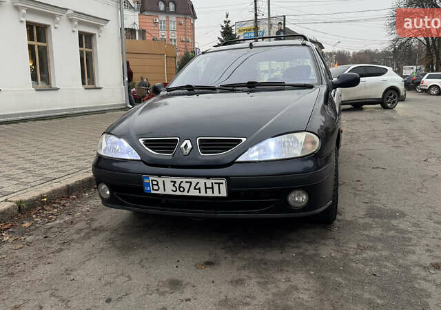 Синий Рено Меган, объемом двигателя 1.6 л и пробегом 310 тыс. км за 3100 $, фото 1 на Automoto.ua