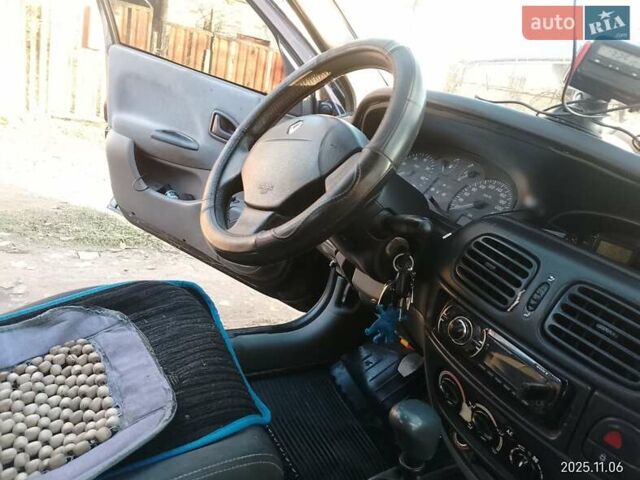 Синий Рено Меган, объемом двигателя 1.4 л и пробегом 420 тыс. км за 2408 $, фото 4 на Automoto.ua