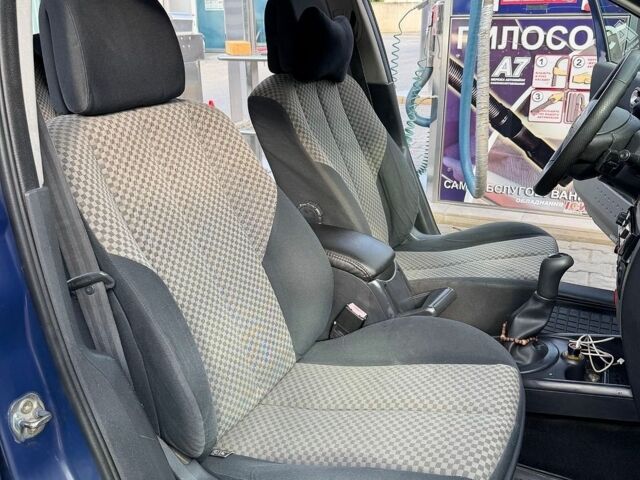 Синий Рено Меган, объемом двигателя 1.46 л и пробегом 210 тыс. км за 3500 $, фото 14 на Automoto.ua