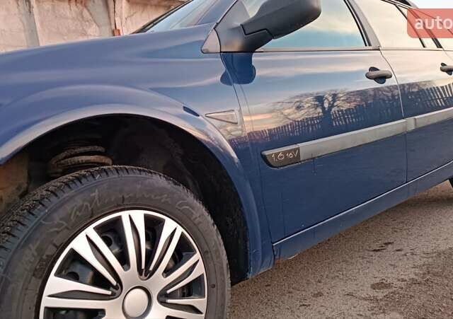 Синий Рено Меган, объемом двигателя 1.6 л и пробегом 205 тыс. км за 3650 $, фото 45 на Automoto.ua