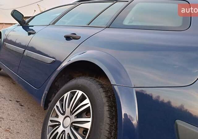 Синий Рено Меган, объемом двигателя 1.6 л и пробегом 205 тыс. км за 3650 $, фото 46 на Automoto.ua