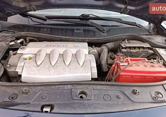 Синий Рено Меган, объемом двигателя 1.6 л и пробегом 205 тыс. км за 3650 $, фото 72 на Automoto.ua