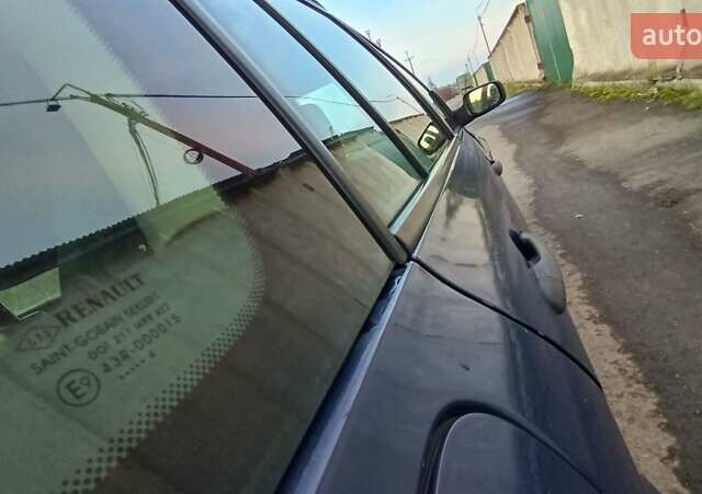 Синий Рено Меган, объемом двигателя 1.6 л и пробегом 205 тыс. км за 3650 $, фото 61 на Automoto.ua